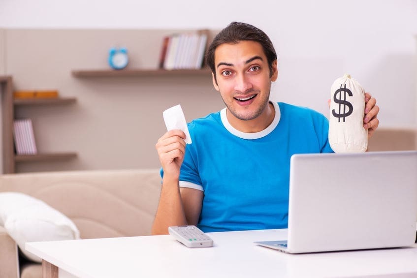 Sport bet addicted man betting at home