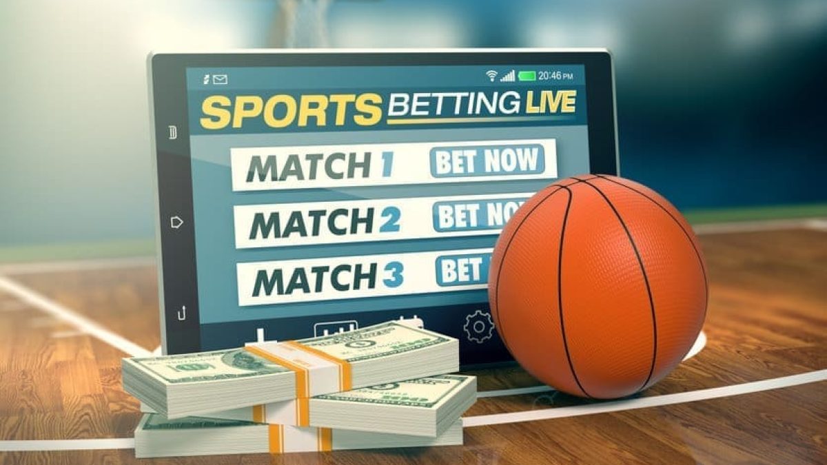 tablet pc with app for sport bets, stacks of banknotes and a basketball ball, concept of online bets (3d render)